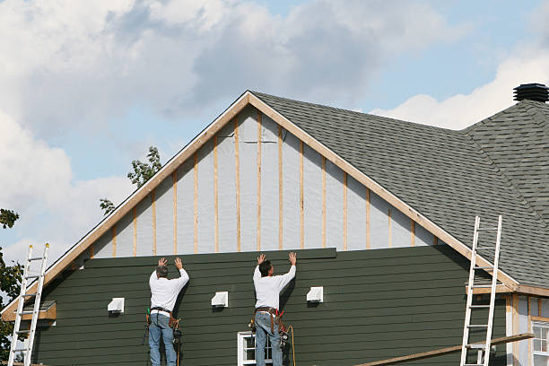 Professional Siding Contractor technician working in Norfolk, MA